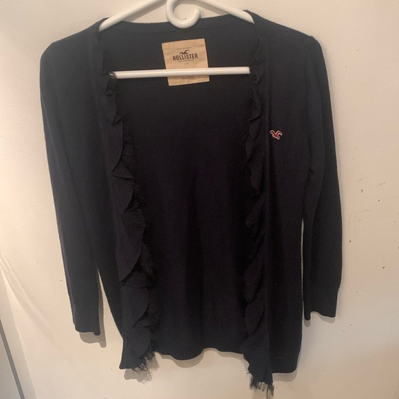 Super Cute Stylish Hollister Black light sweater w/frilly trim SZ Small - Picture 1 of 6